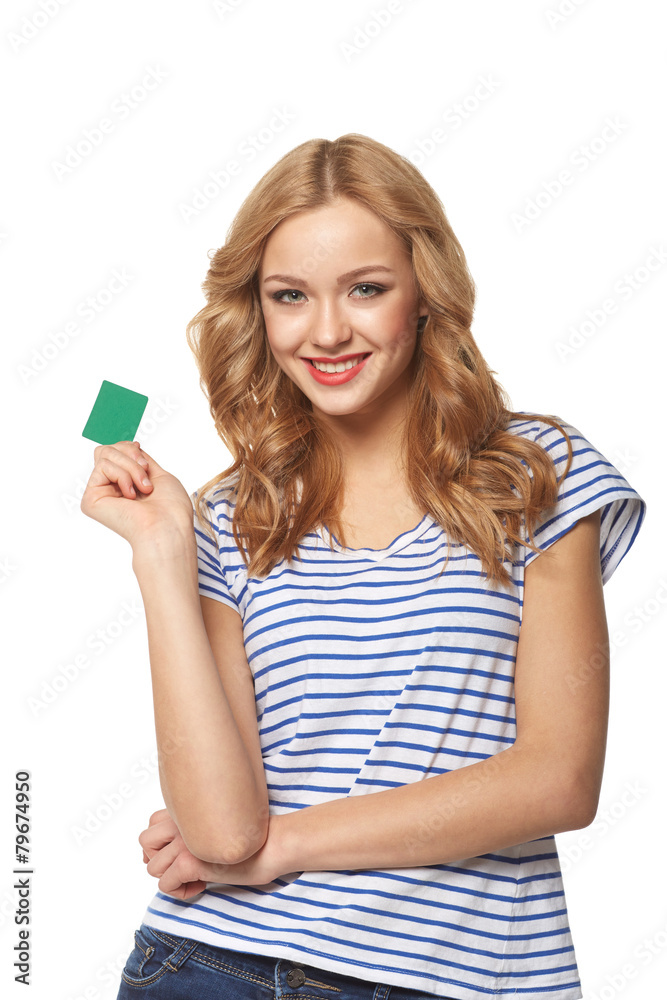 Happy smiling girl showing blank credit card and gesturing thumb Happy smiling girl showing blank credit card and gesturing thumb