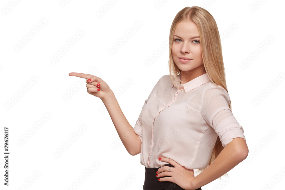 Young cute smiling emotional girl pointing to the side at copy s Young cute smiling emotional girl pointing to the side at copy s
