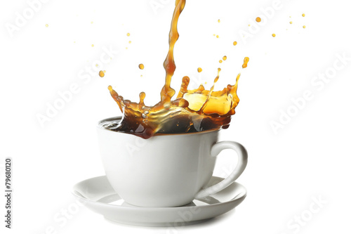 Pouring coffee in cup