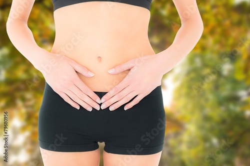 Fit woman with stomach pain