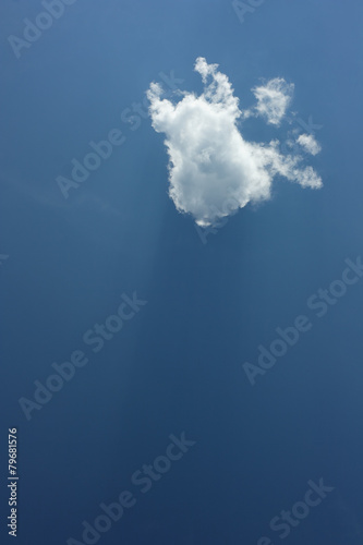Slika na platnu White small cloud against blue sky.