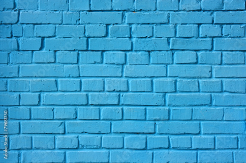 The brick wall painted in blue