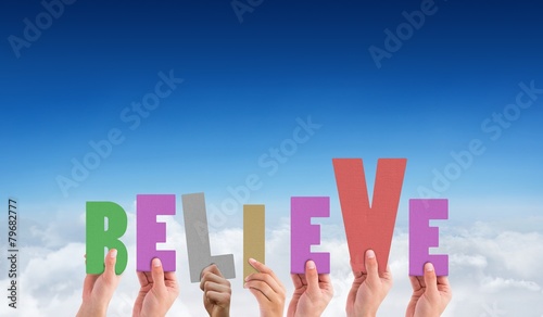 Composite image of hands holding up believe