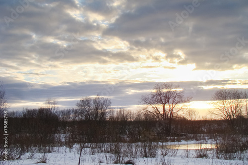winter landscape on the background of colorful sky