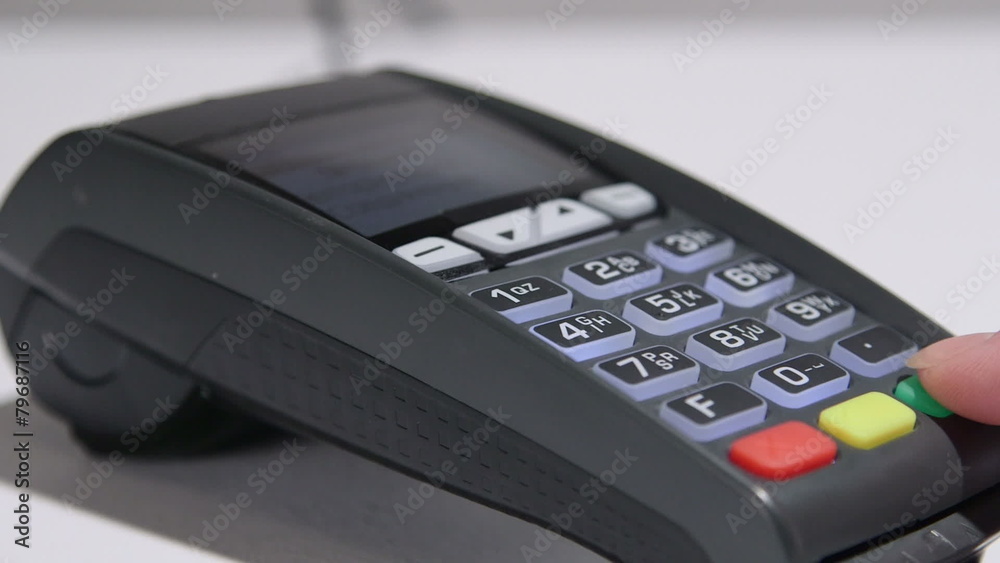 Dolly: Person using credit card payment terminal Dolly: Person using credit card payment terminal