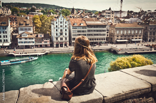 Female student looking at Zurich cityscape, Switzerland
