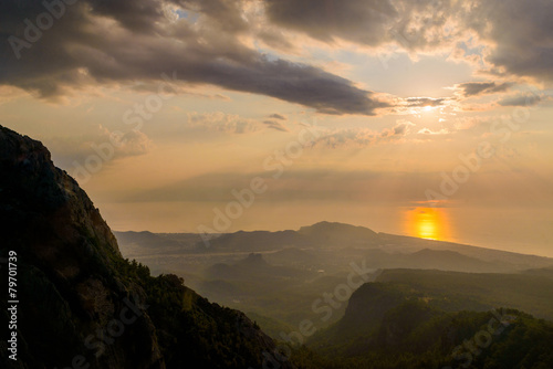 majestic Sunrise over the mountains with sunbeams