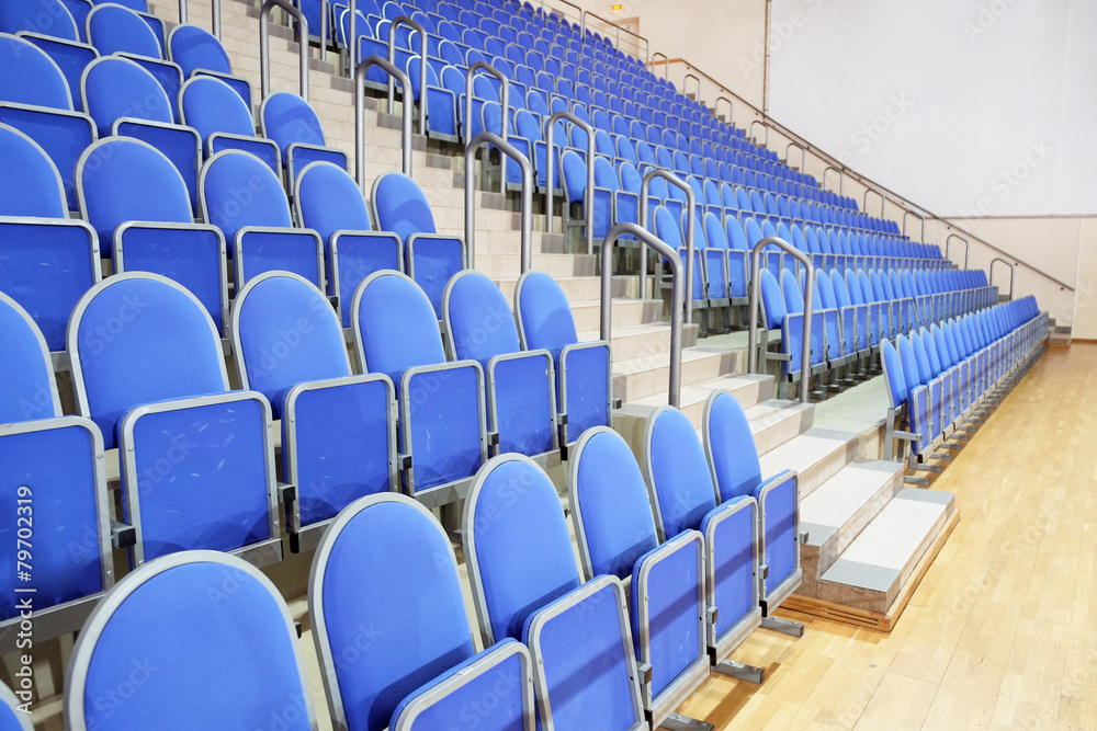 Obraz premium Blue stadium seats hall handball