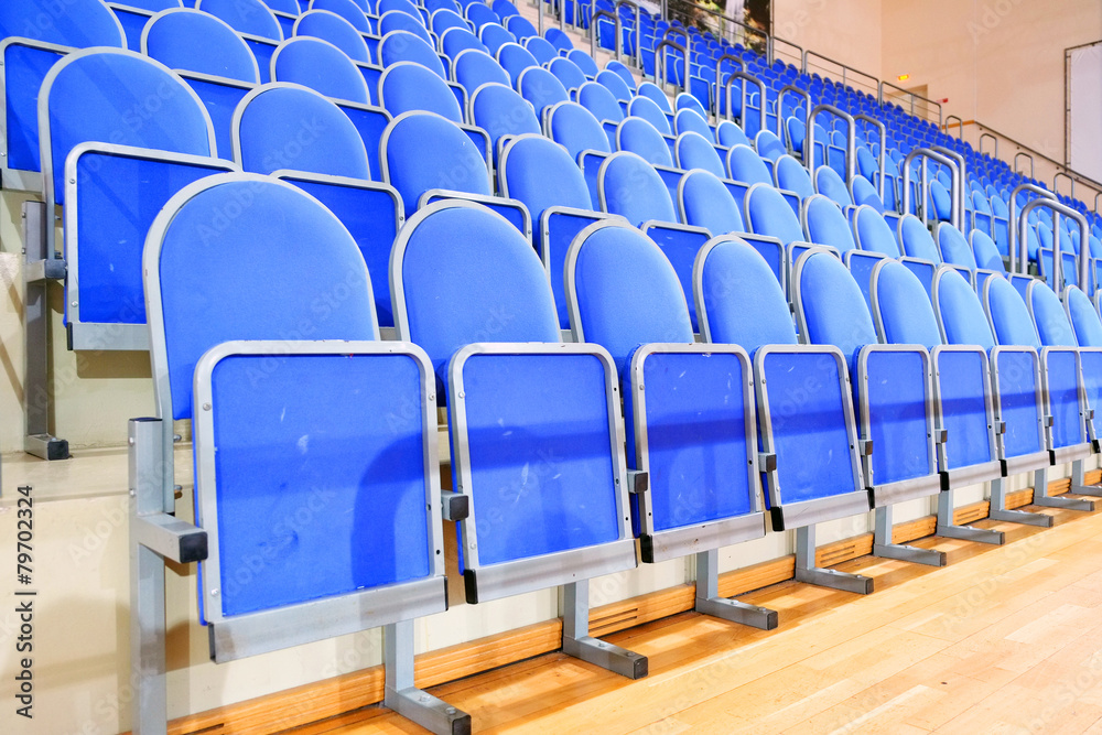 Obraz premium Blue stadium seats hall handball
