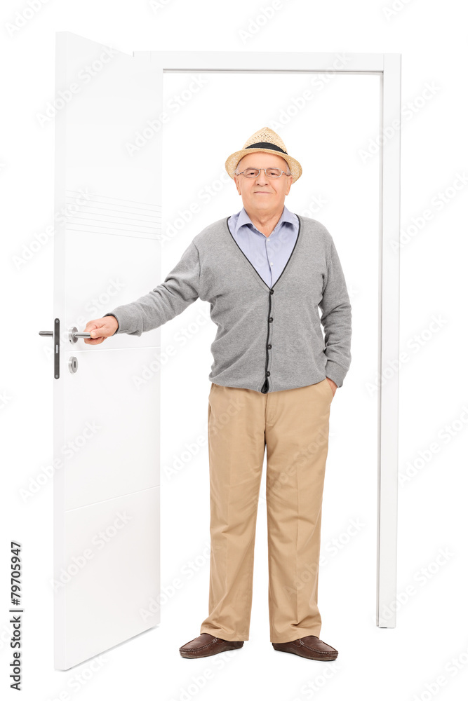 Full length portrait of a senior entering a room Full length portrait of a senior entering a room