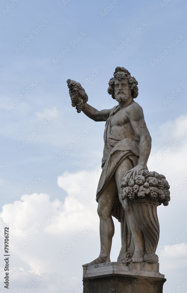 Statue of Autumn, or Bacchus in Holy Trinity Bridge, Florence Statue of Autumn, or Bacchus in Holy Trinity Bridge, Florence