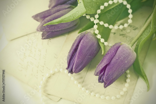 Fototapeta Naklejka Na Ścianę i Meble -  Old love letters and purple tulips