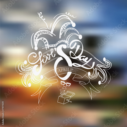 Fool's day text over blur background with  surprise box