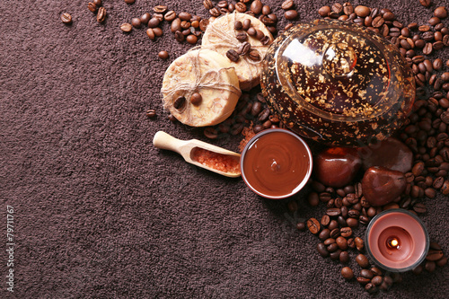 Composition of soap, chocolate in bowl and coffee beans