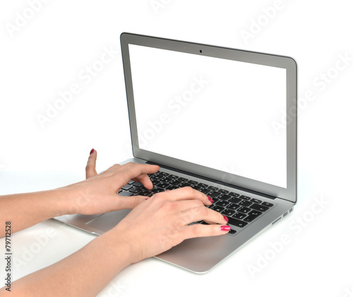 Hands typing on keyboard computer laptop with blank copy-space s