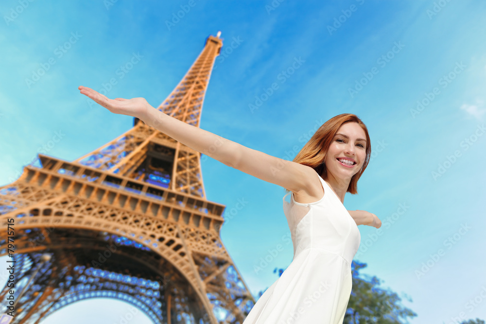 Happy woman tourist in Paris