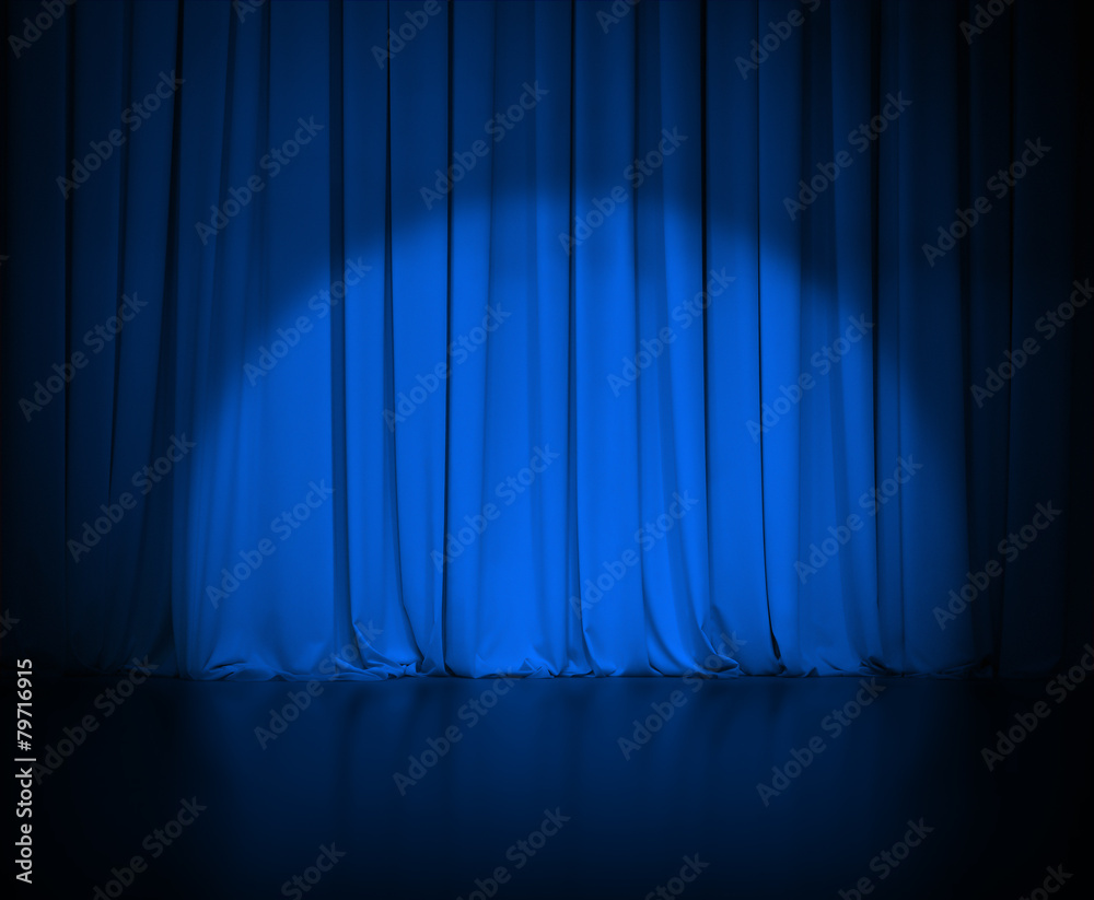 theatre dark blue curtain or drapes with light spot