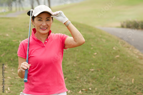 Happy lady golfer