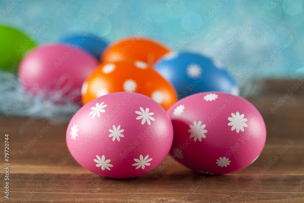 Colored Easter eggs on blue background