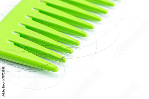 Green comb with hair