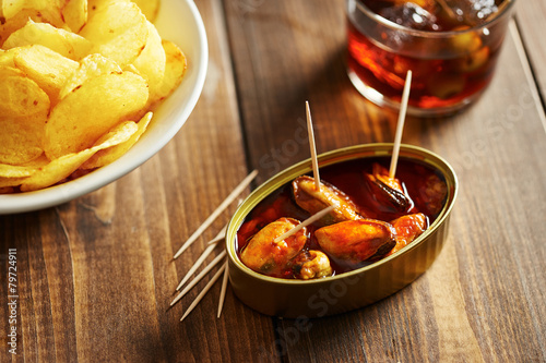 Mussels in vinegar with vermouth and other appetizers photo