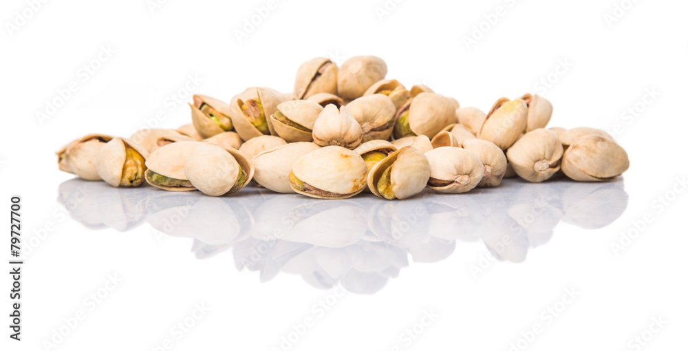 Pistachio nuts over white background Pistachio nuts over white background