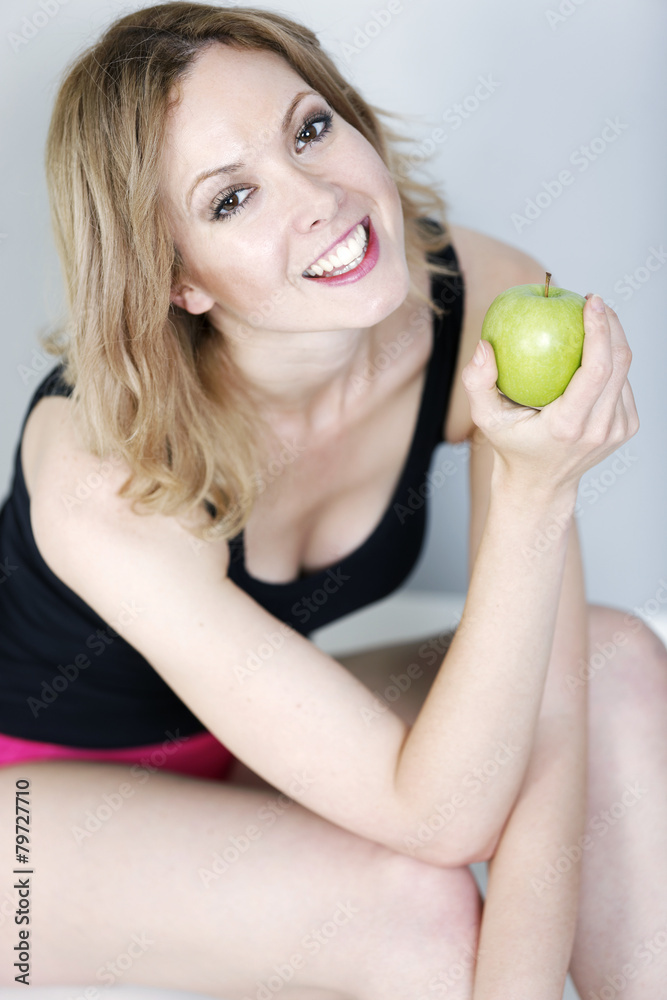 Woman eating an apple Woman eating an apple