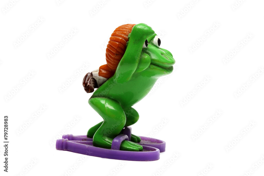 Naklejka premium toy frog photographed close-up