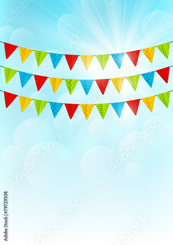 Color party flags on sunny background