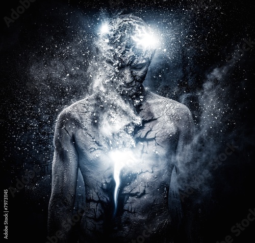 Man with conceptual spiritual body art photo