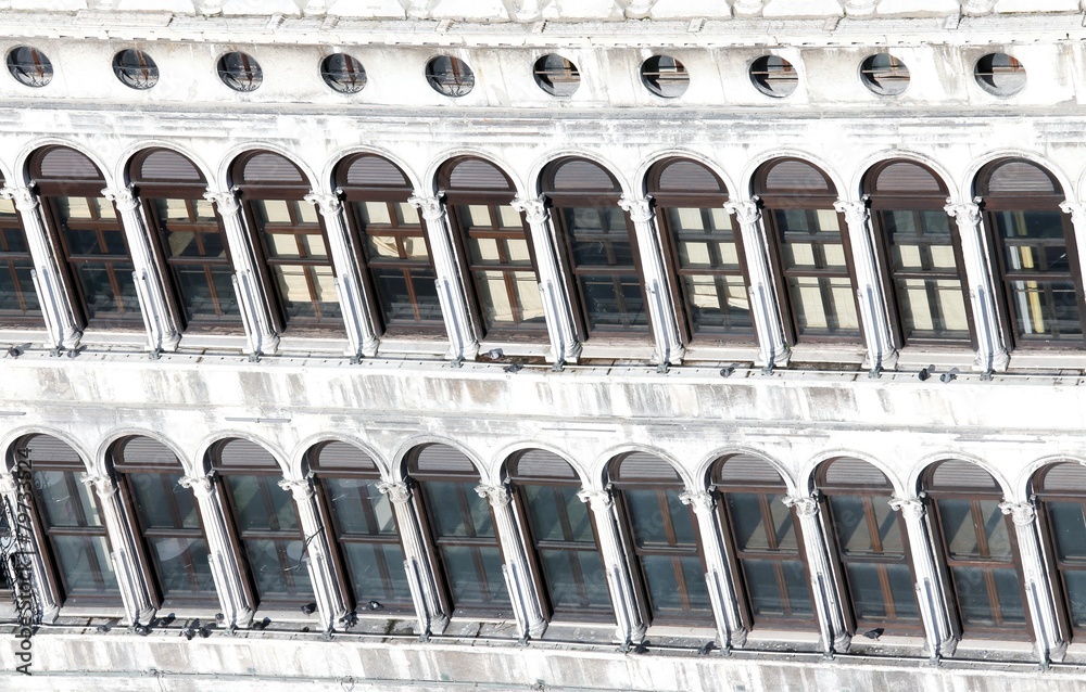 Windows in the historic palace in saint Mark Square in Venice