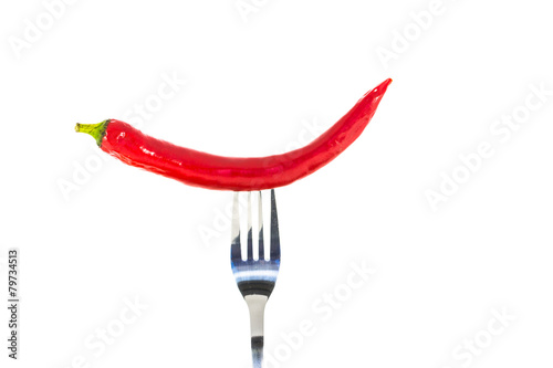 Red hot chili pepper on the fork