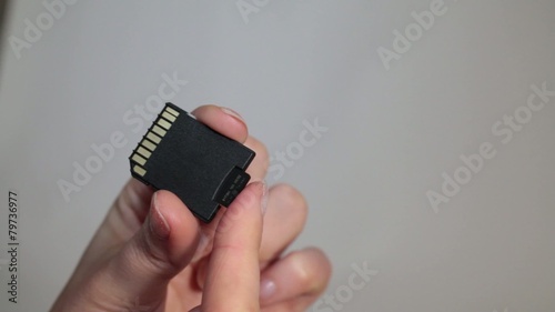 Sliding MicroSD Card Into MiniSD Adapter photo