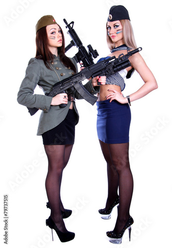 Two women in the marine and the military uniforms © art_zzz