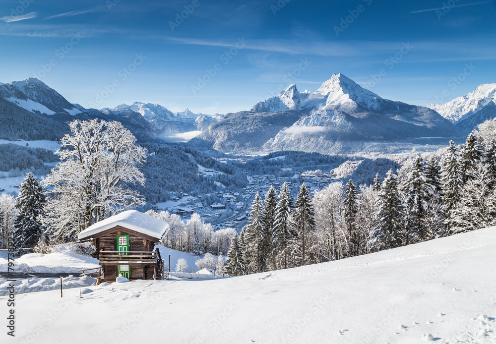 Idyllic winter landscape the Alps with mountain chalet