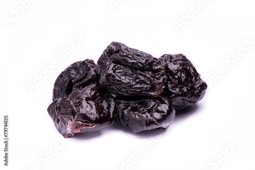 dried prunes fruit isolated on white background