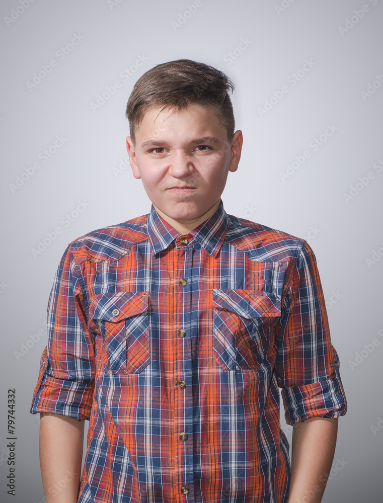 Teenager on gray-white background