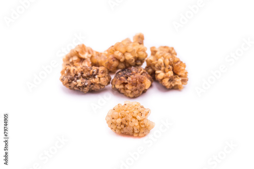 dried mulberries fruit isolated on white background