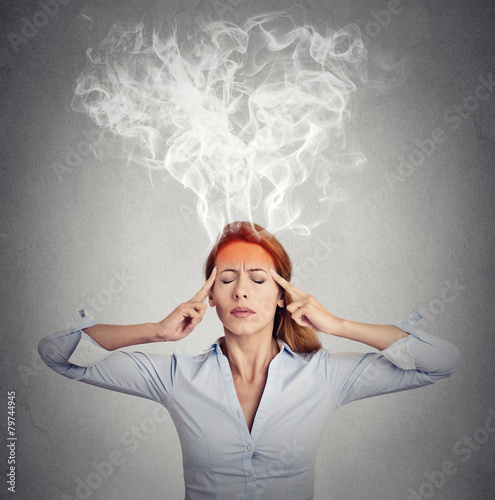 woman thinking too hard steam coming out up of head photo