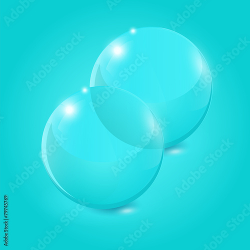 Glass balls on blue background