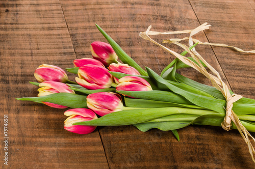 Bouquet of fresh pink and yellow tulips