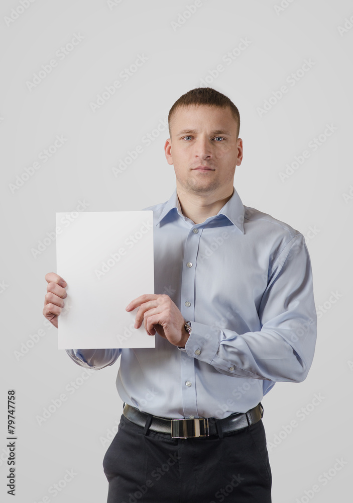 Serious young man with a banner