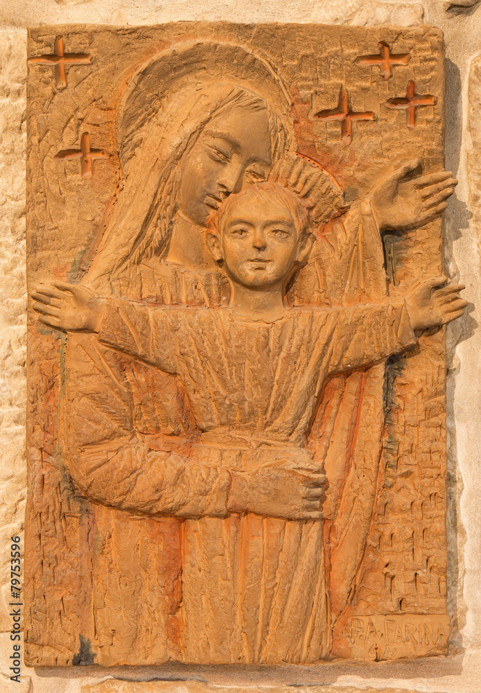 Bethlehem - Madonna with the child. The relief in terracotta .