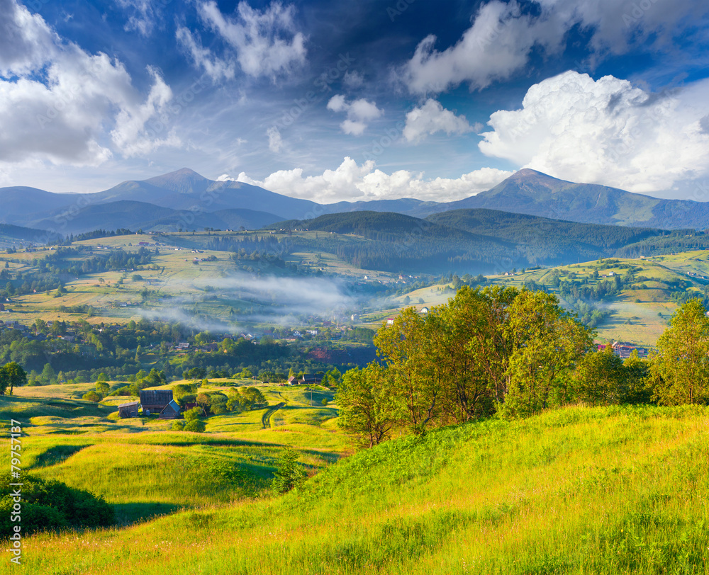 Obraz premium Colorful summer morning in mountain village.