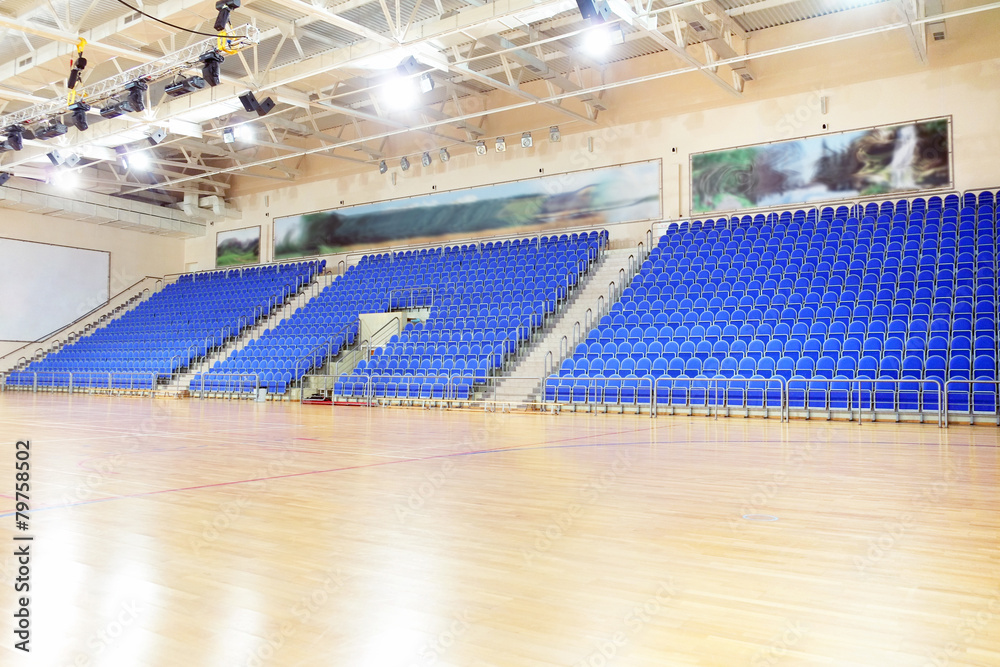 Obraz premium Blue stadium seats hall handball