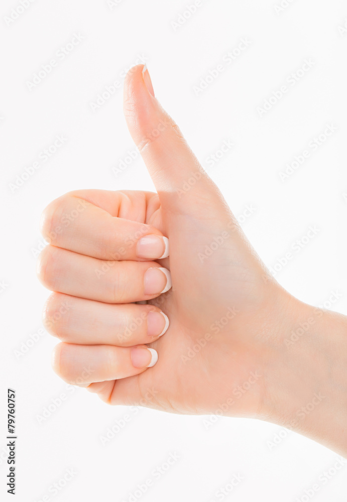 Female hand gesturing the ok sign isolated on white Female hand gesturing the ok sign isolated on white
