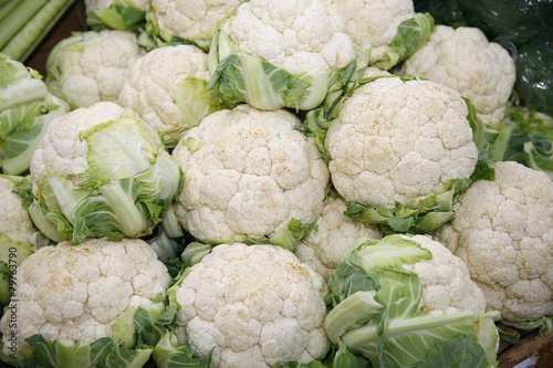 Fresh cauliflower on market stall