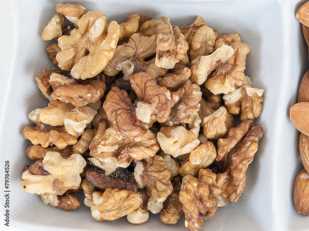 Walnuts in a white dish Walnuts in a white dish