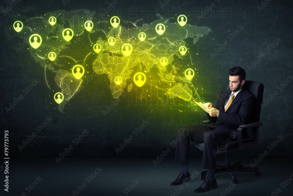 Businessman in office with tablet and social network world map Businessman in office with tablet and social network world map
