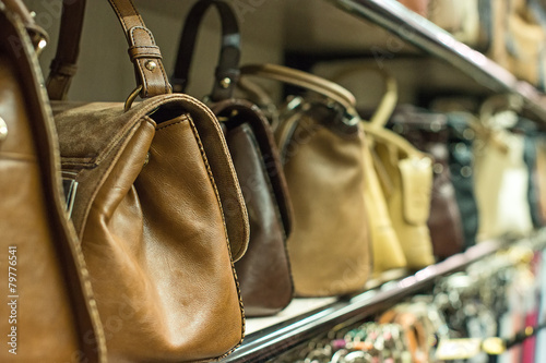 Leather handbags collection in the store. © M-Production